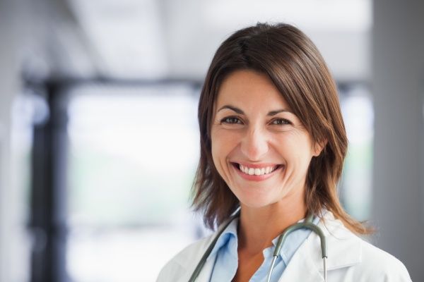 Smiling female nurse practitioner from shoulders up