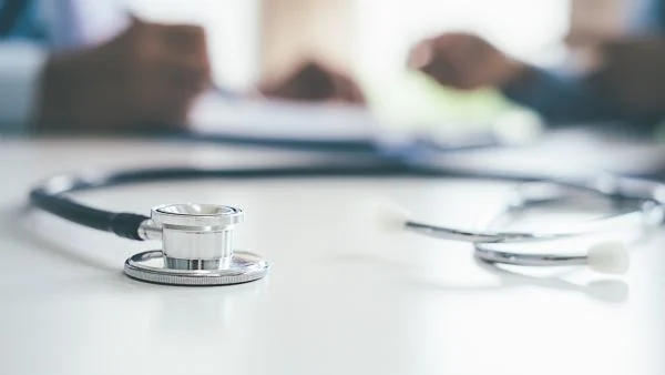 Close-up of a stethoscope on a white surface