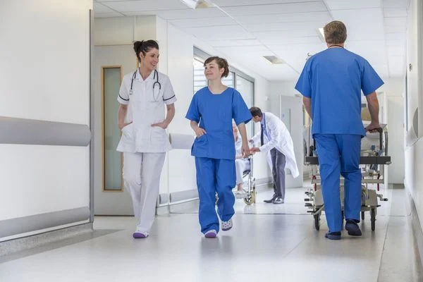 Health care workers going about their day in a hospital